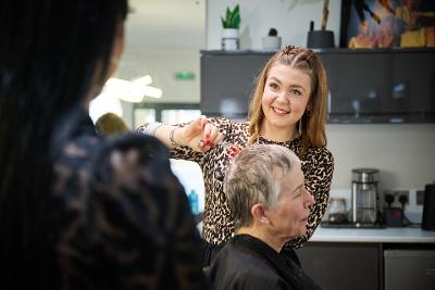 Hairdresser Cutting Female Landscape