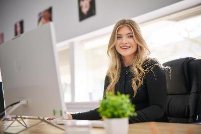 Female Computer User Looking at Camera