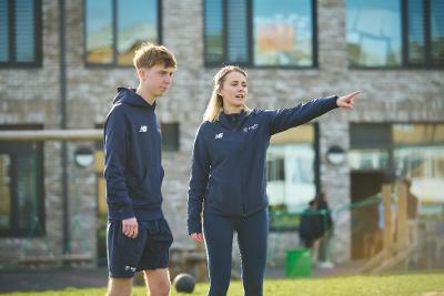 Male and Female Coach Landscape